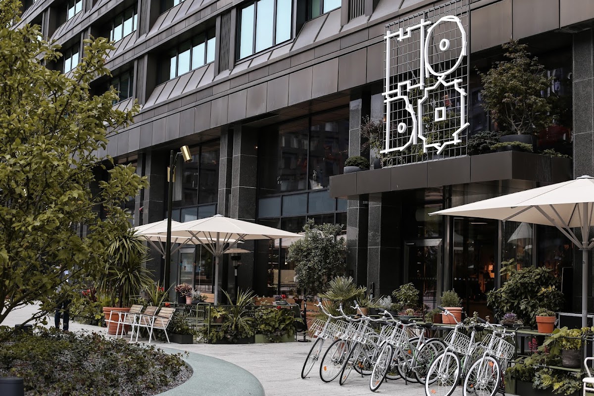 The lively, plant-filled lobby of Hobo Hotel in central Stockholm